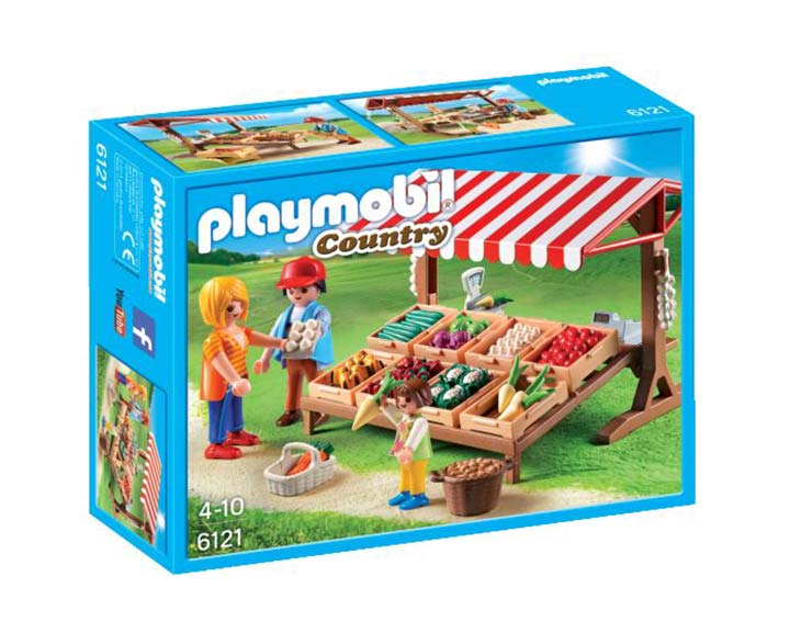 Marchand avec étal de légumes