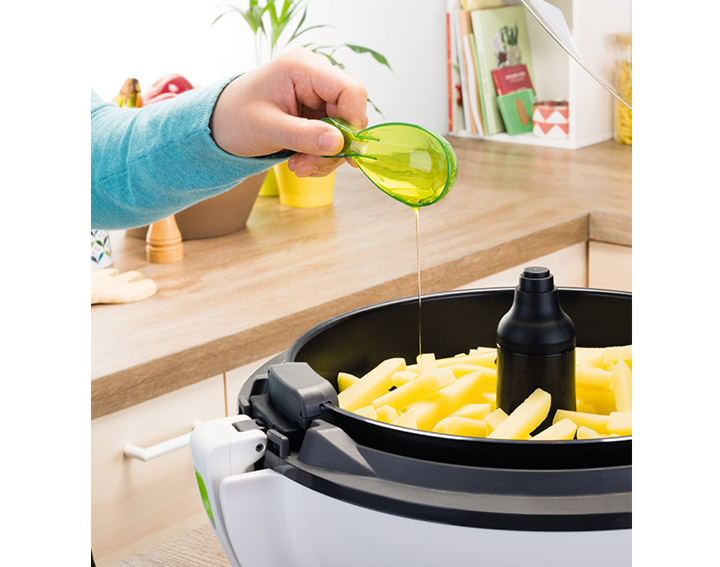 Une seule cuillère d'huile pour 1,5 kg de frites fraîches grâce à la technologie exclusive du système d'air chaud pulsé breveté Actifry@