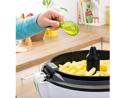 Une seule cuillère d'huile pour 1,5 kg de frites fraîches grâce à la technologie exclusive du système d'air chaud pulsé breveté Actifry@
